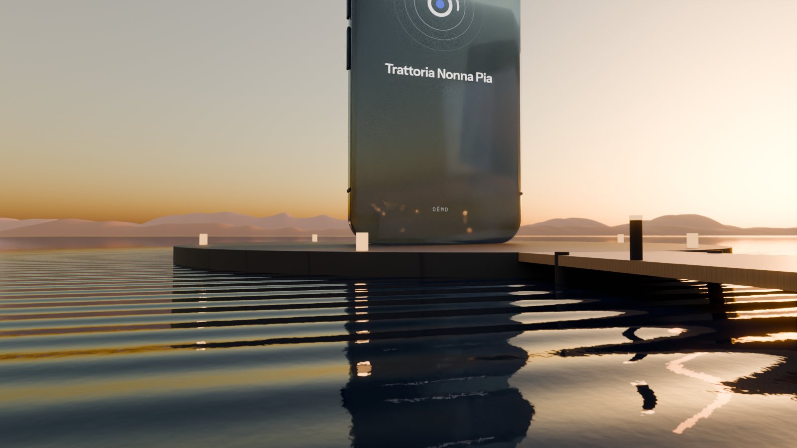 Démo : un téléphone géant posé sur le lac, au coucher du soleil. Il sonne, des cercles partent sur l’eau.